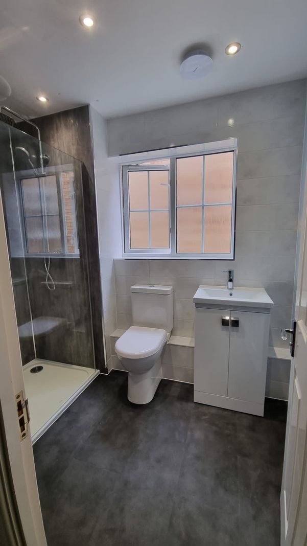 grey ceramic and white bathroom