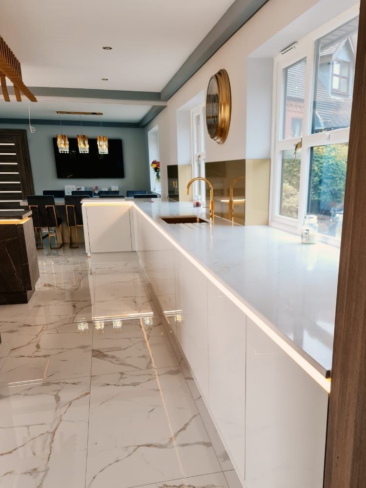 White shiny ceramic kitchen gold sink and drawers