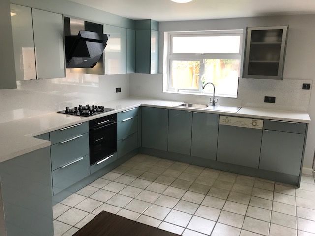 Light grey blue and white shiny kitchen